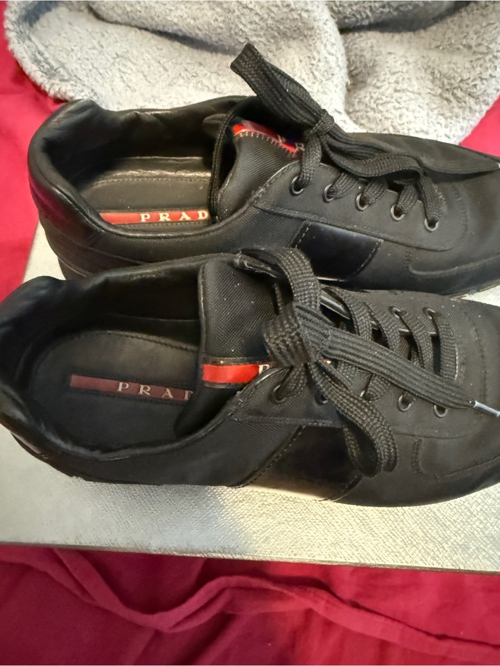 Prada Black Lace-Up Low-Top Sneakers with Red Accent